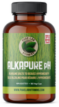 Brown supplement bottle with green label on a white background